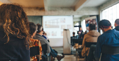 Photo of sitting in a conference